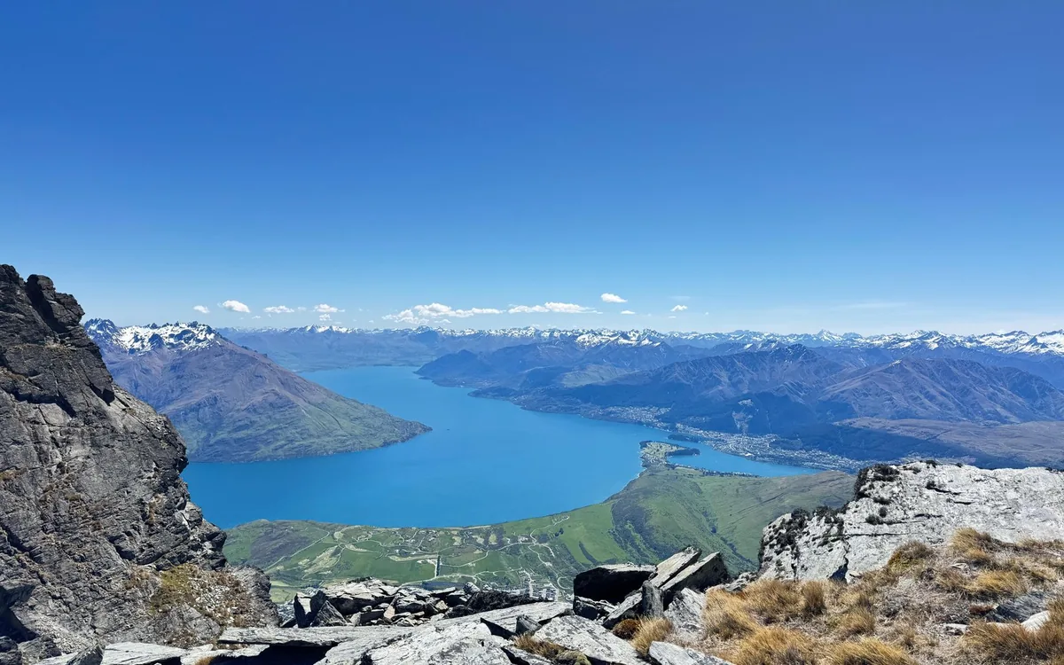 Lake Wakatipu seen from a helicopter, with mountains on both shores